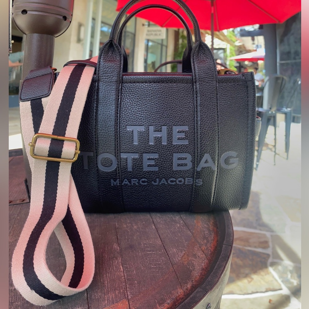 Black and beige strap and bag